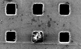 Dust Particle Trapped in Plasmonic Mesh Hole. Dust Particle Trapped in Plasmonic Mesh Hole.